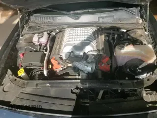 2021 Dodge Challenger SRT Hellcat с VIN 2C3CDZC9XMH601650, выставлен на аукционе Copart как лот 70405545 с пробегом 33 571 миль миль и Списание • Salvage title. История ставок и продаж доступна на DreamBid. Изображение 15.