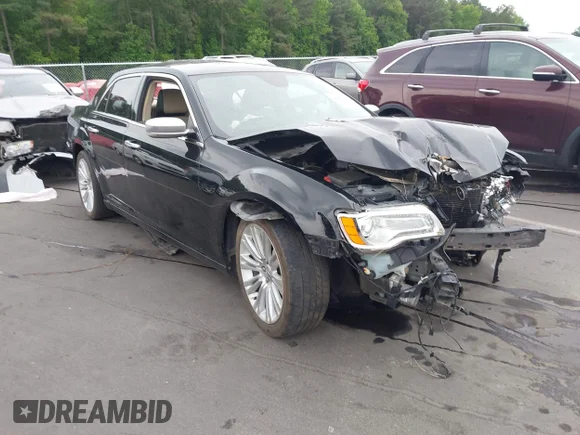 ✅ 2012 Chrysler 300 Limited • VIN: 2C3CCACG5CH253239 • Lot: 44988694. Listed on IAAI with 124,239 mi. Free auction sales archive from the USA and detailed vehicle history report at DreamBid. Image 1.