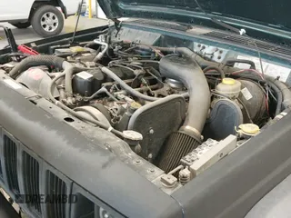 ✅ 1999 Jeep Cherokee SE • VIN: 1J4FF27S0XL575410 • Lot: 42787311. Listed on IAAI with 174,830 mi. Free auction sales archive from the USA and detailed vehicle history report at DreamBid. Image 12.