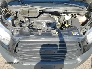 ✅ 2018 Ford Transit • VIN: 1FTYE1YM4JKA38600 • Lot: 59181995. Listed on Copart with 99,360 mi. Free auction sales archive from the USA and detailed vehicle history report at DreamBid. Image 14.