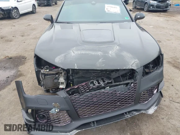✅ 2014 Audi RS 7 • VIN: WUAW2CFC7EN901287 • Лот: 43700469. Опубліковано раніше на IAAI з пробігом 58 876 миль. Безкоштовний доступ до архіву аукціонних продажів зі США та докладний звіт про історію автомобіля на DreamBid. Зображення 6.