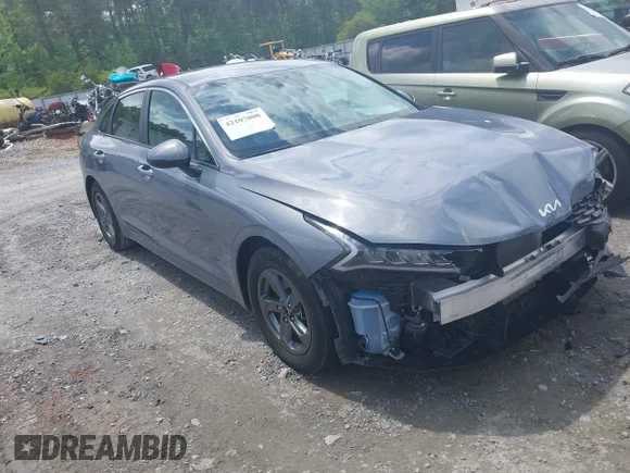 ✅ 2022 Kia K5 LXS • VIN: 5XXG14J25NG130168 • Лот: 42107008. Опубліковано раніше на IAAI з пробігом 39 661 миль. Безкоштовний доступ до архіву аукціонних продажів зі США та докладний звіт про історію автомобіля на DreamBid. Зображення 1.