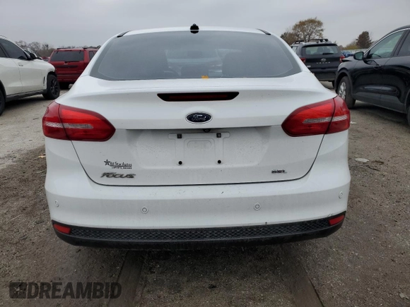✅ 2017 Ford Focus SEL • VIN: 1FADP3H20HL209808 • Lot: 93004985. Wystawiony na Copart z przebiegiem 85 304 mil. Bezpłatny archiwum sprzedaży aukcyjnych z USA i szczegółowy raport historii pojazdu na DreamBid. Zdjęcie 6.