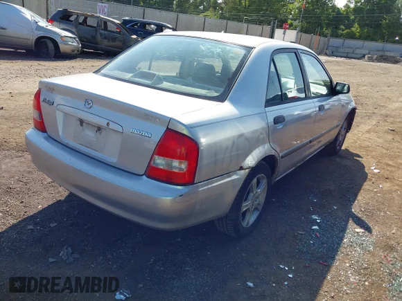 ✅ 2002 Mazda Protege DX • VIN: JM1BJ225921572885 • Лот: 43158522. Опубліковано раніше на IAAI з пробігом 148 444 миль. Безкоштовний доступ до архіву аукціонних продажів зі США та докладний звіт про історію автомобіля на DreamBid. Зображення 4.