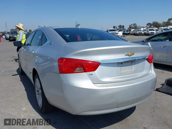 ✅ 2017 Chevrolet Impala LT • VIN: 1G1105S3XHU199628 • Lot: 45306174. Listed on IAAI with 199,719 mi. Free auction sales archive from the USA and detailed vehicle history report at DreamBid. Image 3.