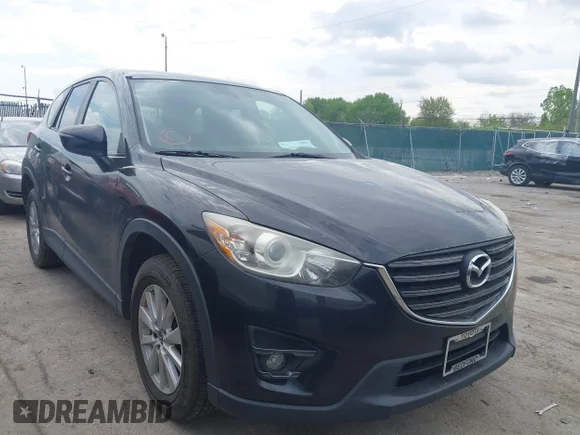 ✅ 2016 Mazda CX-5 Touring • VIN: JM3KE4CY1G0718466 • Lot: 45044010. Wystawiony na IAAI z przebiegiem 121 704 mil. Bezpłatny archiwum sprzedaży aukcyjnych z USA i szczegółowy raport historii pojazdu na DreamBid. Zdjęcie 1.