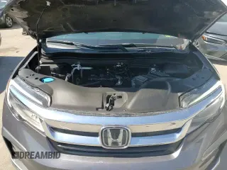 ✅ 2021 Honda Pilot Touring 8-Passenger • VIN: 5FNYF5H95MB023556 • Lot: 71252265. Listed on Copart with 121,768 mi. Free auction sales archive from the USA and detailed vehicle history report at DreamBid. Image 15.