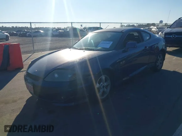 ✅ 2006 Hyundai Tiburon GS • VIN: KMHHM65D76U229133 • Lot: 44103885. Wystawiony na IAAI z przebiegiem 201 258 mil. Bezpłatny archiwum sprzedaży aukcyjnych z USA i szczegółowy raport historii pojazdu na DreamBid. Zdjęcie 2.