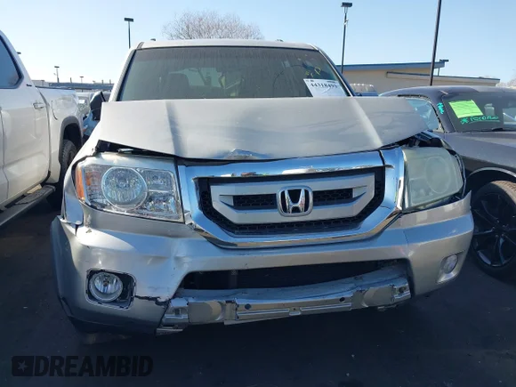 ✅ 2010 Honda Pilot EX-L • VIN: 5FNYF3H58AB023337 • Lot: 44318495. Wystawiony na IAAI z przebiegiem 190 552 mil. Bezpłatny archiwum sprzedaży aukcyjnych z USA i szczegółowy raport historii pojazdu na DreamBid. Zdjęcie 6.