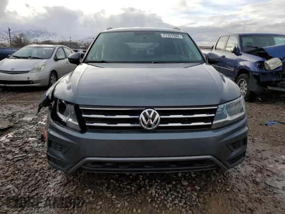 ✅ 2019 Volkswagen Tiguan S • VIN: 3VV0B7AX5KM027582 • Лот: 71157592. Опубліковано раніше на Copart з пробігом 71 212 миль. Безкоштовний доступ до архіву аукціонних продажів зі США та докладний звіт про історію автомобіля на DreamBid. Зображення 5.
