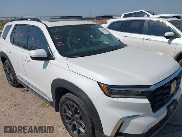 ✅ 2023 Honda Pilot Touring • VIN: 5FNYG2H77PB013738 • Lot: 42013874. Wystawiony na IAAI z przebiegiem 33 677 mil. Bezpłatny archiwum sprzedaży aukcyjnych z USA i szczegółowy raport historii pojazdu na DreamBid. Zdjęcie 6.