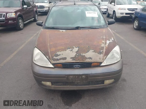 ✅ 2000 Ford Focus ZX3 • VIN: 3FAFP3138YR228443 • Lot: 43047729. Listed on IAAI with 148,727 mi. Free auction sales archive from the USA and detailed vehicle history report at DreamBid. Image 6.