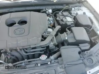 ✅ 2024 Mazda 3 S • VIN: 3MZBPAAM0RM436849 • Lot: 53386395. Listed on Copart with 3,797 mi. Free auction sales archive from the USA and detailed vehicle history report at DreamBid. Image 13.