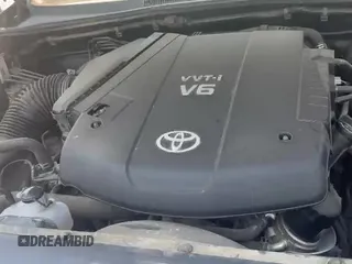 ✅ 2014 Toyota Tacoma • VIN: 5TFLU4ENXEX089541 • Lot: 42989505. Listed on IAAI with 142,040 mi. Free auction sales archive from the USA and detailed vehicle history report at DreamBid. Image 13.