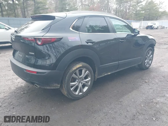 ✅ 2023 Mazda CX-30 S Select • VIN: 3MVDMBBM2PM563753 • Lot: 44401958. Listed on IAAI with 37,046 mi. Free auction sales archive from the USA and detailed vehicle history report at DreamBid. Image 4.