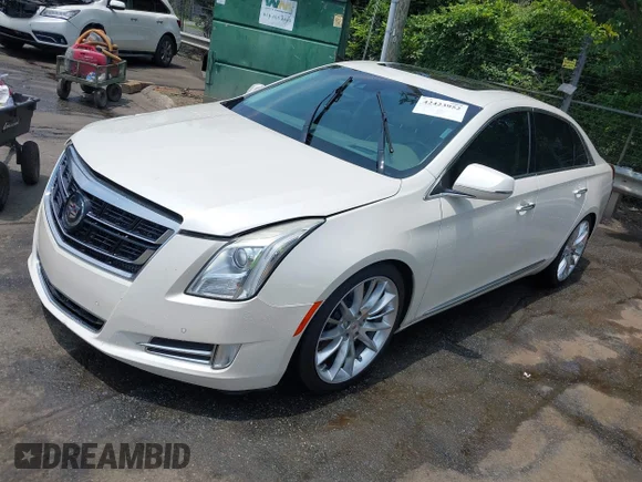 ✅ 2014 Cadillac XTS Platinum • VIN: 2G61W5S83E9165236 • Лот: 42423952. Опубликован ранее на IAAI с пробегом 165 753 миль. Бесплатный доступ к архиву аукционных продаж из США и подробный отчёт об истории автомобиля на DreamBid. Изображение 2.