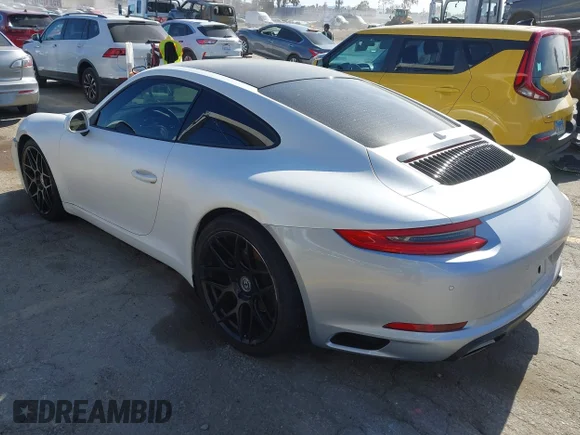 ✅ 2017 Porsche 911 Carrera • VIN: WP0CA2A98HS142809 • Лот: 44940827. Опубліковано раніше на IAAI з пробігом 47 734 миль. Безкоштовний доступ до архіву аукціонних продажів зі США та докладний звіт про історію автомобіля на DreamBid. Зображення 3.