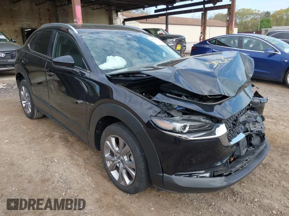 ✅ 2023 Mazda CX-30 S Select • VIN: 3MVDMBBM1PM543705 • Lot: 45010058. Listed on IAAI with 14,881 mi. Free auction sales archive from the USA and detailed vehicle history report at DreamBid. Image 1.