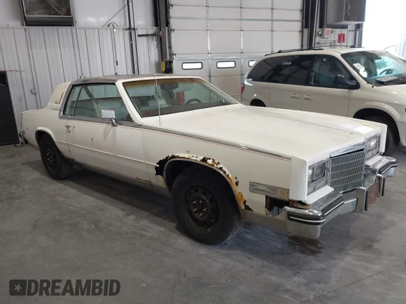 ✅ 1985 Cadillac Eldorado • VIN: 1G6EL5781FE628685 • Лот: 43014858. Опубліковано раніше на IAAI з пробігом 95 614 миль. Безкоштовний доступ до архіву аукціонних продажів зі США та докладний звіт про історію автомобіля на DreamBid. Зображення 1.