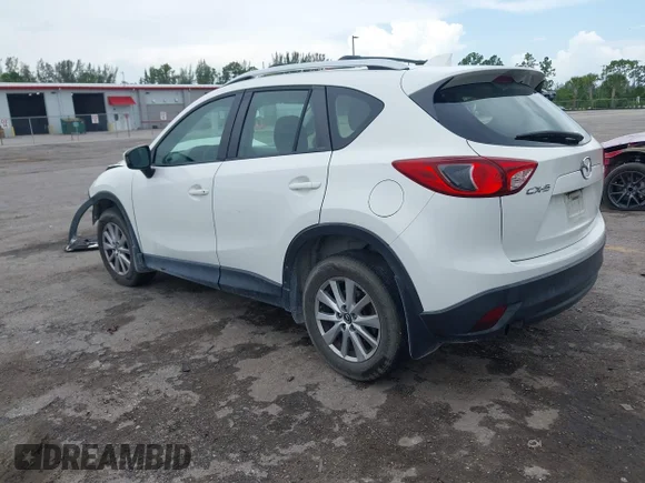 ✅ 2015 Mazda CX-5 Sport • VIN: JM3KE2BE3F0444634 • Lot: 45496418. Listed on IAAI with 255,456 mi. Free auction sales archive from the USA and detailed vehicle history report at DreamBid. Image 3.