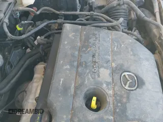 ✅ 2010 Mazda 3 i Sport • VIN: JM1BL1SF5A1239482 • Лот: 42826492. Опубликован ранее на IAAI с пробегом 124 870 миль. Бесплатный доступ к архиву аукционных продаж из США и подробный отчёт об истории автомобиля на DreamBid. Изображение 12.