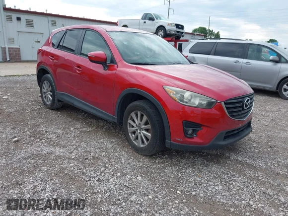 ✅ 2016 Mazda CX-5 Touring • VIN: JM3KE2CY3G0911397 • Lot: 45138776. Wystawiony na IAAI z przebiegiem 140 288 mil. Bezpłatny archiwum sprzedaży aukcyjnych z USA i szczegółowy raport historii pojazdu na DreamBid. Zdjęcie 1.