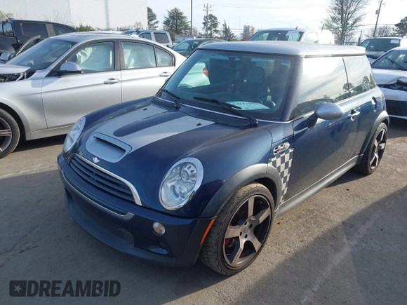 ✅ 2006 MINI Hardtop S • VIN: WMWRE33516TL23088 • Lot: 44215880. Wystawiony na IAAI z przebiegiem 131 480 mil. Bezpłatny archiwum sprzedaży aukcyjnych z USA i szczegółowy raport historii pojazdu na DreamBid. Zdjęcie 2.