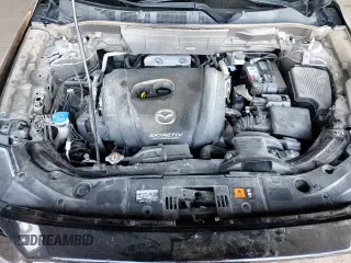 ✅ 2018 Mazda CX-5 Grand Touring • VIN: JM3KFADM4J1384815 • Lot: 81979205. Wystawiony na Copart z przebiegiem 93 216 mil. Bezpłatny archiwum sprzedaży aukcyjnych z USA i szczegółowy raport historii pojazdu na DreamBid. Zdjęcie 15.