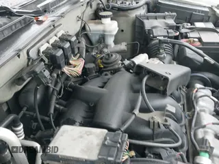 2005 Mercury Mariner Luxury z VIN 4M2CU561X5DJ16539, wystawiony jako IAAI lot #41572981 z przebiegiem 157 461 mil mil oraz . Historia ofert i sprzedaży dostępna na DreamBid. Obrazek 12.