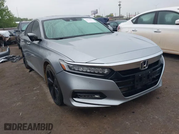 ✅ 2018 Honda Accord Touring • VIN: 1HGCV2F99JA008627 • Lot: 44892593. Listed on IAAI with 106,115 mi. Free auction sales archive from the USA and detailed vehicle history report at DreamBid. Image 1.