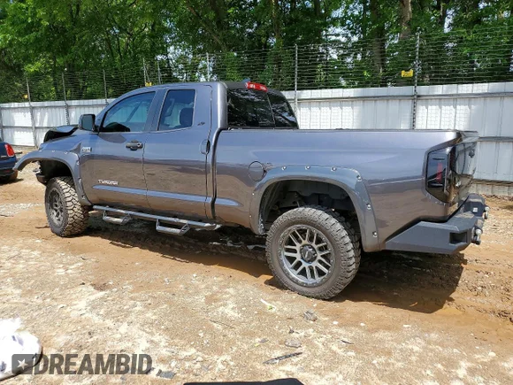 ✅ 2020 Toyota Tundra SR5 • VIN: 5TFUY5F14LX940899 • Lot: 51950636. Listed on Copart with 123,899 mi. Free auction sales archive from the USA and detailed vehicle history report at DreamBid. Image 2.