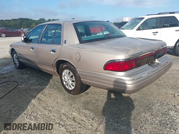 ✅ 1995 Mercury Grand Marquis GS • VIN: 2MELM74W1SX677232 • Лот: 43194387. Опубликован ранее на IAAI с пробегом 151 445 миль. Бесплатный доступ к архиву аукционных продаж из США и подробный отчёт об истории автомобиля на DreamBid. Изображение 3.