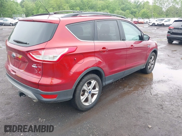 ✅ 2014 Ford Escape SE • VIN: 1FMCU9GX5EUC99540 • Lot: 42215042. Wystawiony na IAAI z przebiegiem 140 097 mil. Bezpłatny archiwum sprzedaży aukcyjnych z USA i szczegółowy raport historii pojazdu na DreamBid. Zdjęcie 4.