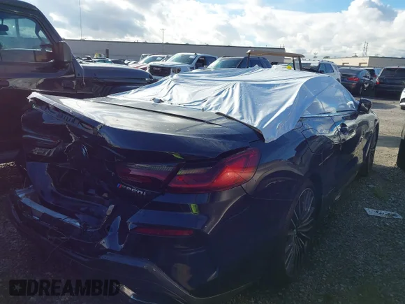 ✅ 2021 BMW 8 Series M850i xDrive • VIN: WBAFY4C03MCF29680 • Lot: 43428815. Wystawiony na IAAI z przebiegiem 26 983 mil. Bezpłatny archiwum sprzedaży aukcyjnych z USA i szczegółowy raport historii pojazdu na DreamBid. Zdjęcie 4.