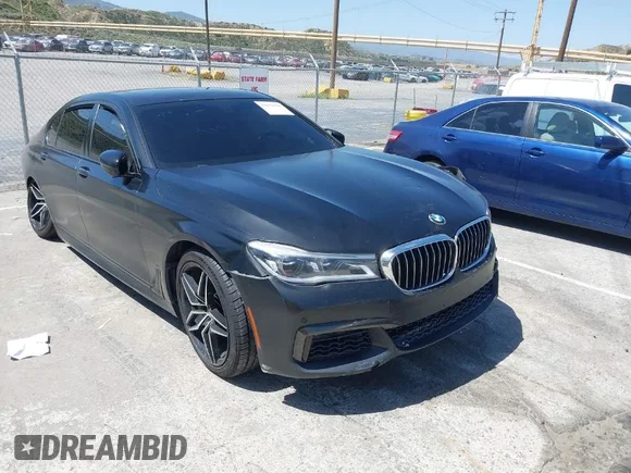 ✅ 2018 BMW 7 Series 750i • VIN: WBA7F0C51JGM23504 • Лот: 39379378. Опубликован ранее на IAAI с пробегом 82 251 миль. Бесплатный доступ к архиву аукционных продаж из США и подробный отчёт об истории автомобиля на DreamBid. Изображение 1.