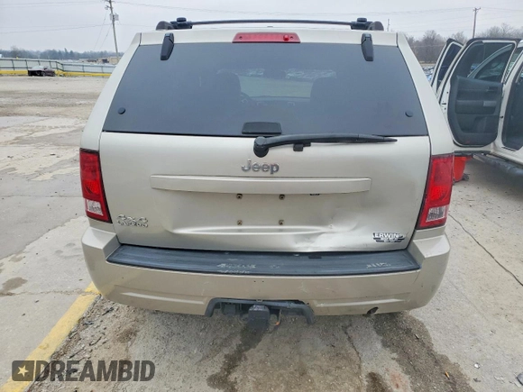 ✅ 2010 Jeep Grand Cherokee Laredo • VIN: 1J4PR4GK1AC123089 • Lot: 98897095. Wystawiony na Copart z przebiegiem 86 376 mil. Bezpłatny archiwum sprzedaży aukcyjnych z USA i szczegółowy raport historii pojazdu na DreamBid. Zdjęcie 6.