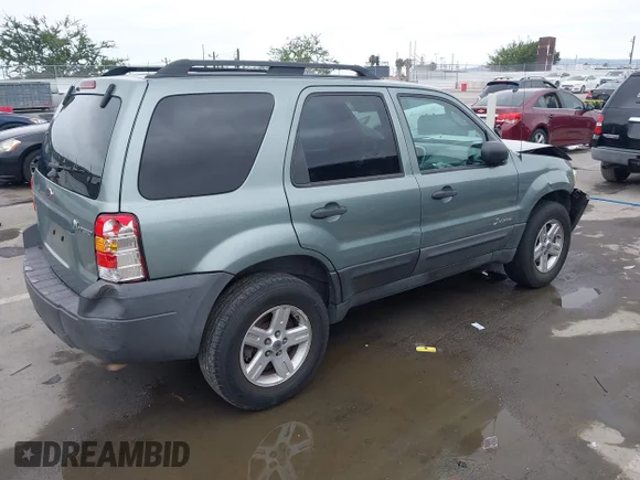 ✅ 2007 Ford Escape Hybrid • VIN: 1FMCU49H67KA31717 • Лот: 45120051. Опубліковано раніше на IAAI з пробігом 167 604 миль. Безкоштовний доступ до архіву аукціонних продажів зі США та докладний звіт про історію автомобіля на DreamBid. Зображення 4.