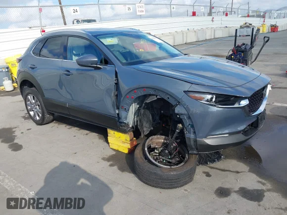 ✅ 2021 Mazda CX-30 Premium • VIN: 3MVDMBDL2MM314482 • Лот: 43329881. Опубліковано раніше на IAAI з пробігом 26 002 миль. Безкоштовний доступ до архіву аукціонних продажів зі США та докладний звіт про історію автомобіля на DreamBid. Зображення 1.