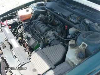 ✅ 1997 Pontiac Bonneville SE • VIN: 1G2HX52K3VH266314 • Lot: 42270685. Wystawiony na IAAI z przebiegiem 169 838 mil. Bezpłatny archiwum sprzedaży aukcyjnych z USA i szczegółowy raport historii pojazdu na DreamBid. Zdjęcie 15.