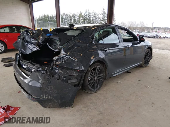 ✅ 2026 Toyota Camry Nightshade • VIN: 4T1DBADK6TU544654 • Lot: 44705967. Wystawiony na IAAI z przebiegiem 13 500 mil. Bezpłatny archiwum sprzedaży aukcyjnych z USA i szczegółowy raport historii pojazdu na DreamBid. Zdjęcie 4.