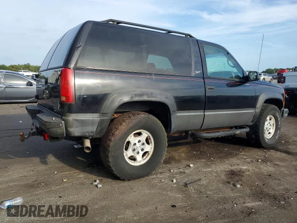 ✅ 1998 Chevrolet Tahoe • VIN: 3GNEK18R0WG124791 • Lot: 51993646. Listed on Copart with 233,783 mi. Free auction sales archive from the USA and detailed vehicle history report at DreamBid. Image 3.