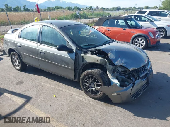 ✅ 2005 Dodge Neon SXT • VIN: 1B3ES56C95D221418 • Lot: 42353948. Wystawiony na IAAI z przebiegiem 128 537 mil. Bezpłatny archiwum sprzedaży aukcyjnych z USA i szczegółowy raport historii pojazdu na DreamBid. Zdjęcie 1.