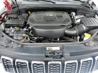 2018 Jeep Grand Cherokee Altitude z VIN 1C4RJFAG7JC163134, wystawiony jako Copart lot #86188365 z przebiegiem 80 035 mil mil oraz Szkoda całkowita • Salvage title. Historia ofert i sprzedaży dostępna na DreamBid. Obrazek 14.