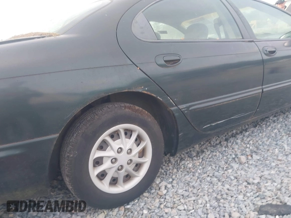 ✅ 1999 Chrysler Concorde LX • VIN: 2C3HD46R5XH746281 • Lot: 44098724. Wystawiony na IAAI z przebiegiem 159 600 mil. Bezpłatny archiwum sprzedaży aukcyjnych z USA i szczegółowy raport historii pojazdu na DreamBid. Zdjęcie 6.
