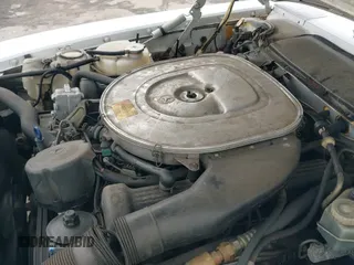 ✅ 1988 Mercedes-Benz 560 SL • VIN: WDBBA48D1JA081816 • Лот: 42384331. Опубликован ранее на IAAI с пробегом 89 586 миль. Бесплатный доступ к архиву аукционных продаж из США и подробный отчёт об истории автомобиля на DreamBid. Изображение 19.