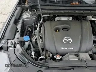 ✅ 2022 Mazda CX-5 S Premium • VIN: JM3KFBDM6N0575010 • Lot: 85858565. Listed on Copart with 80,561 mi. Free auction sales archive from the USA and detailed vehicle history report at DreamBid. Image 14.