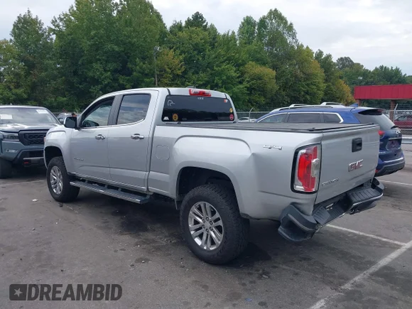 ✅ 2015 GMC Canyon 4WD SLT • VIN: 1GTG6CE35F1267557 • Lot: 43291058. Listed on IAAI with 168,968 mi. Free auction sales archive from the USA and detailed vehicle history report at DreamBid. Image 3.