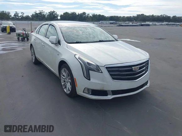 ✅ 2018 Cadillac XTS Luxury • VIN: 2G61M5S36J9142800 • Lot: 43833168. Listed on IAAI with 130,729 mi. Free auction sales archive from the USA and detailed vehicle history report at DreamBid. Image 1.