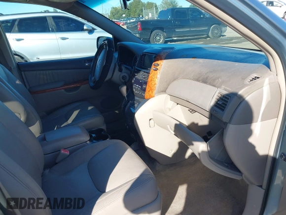 ✅ 2010 Toyota Sienna XLE Limited • VIN: 5TDYK4CC3AS314458 • Lot: 44185750. Wystawiony na IAAI z przebiegiem 210 528 mil. Bezpłatny archiwum sprzedaży aukcyjnych z USA i szczegółowy raport historii pojazdu na DreamBid. Zdjęcie 5.