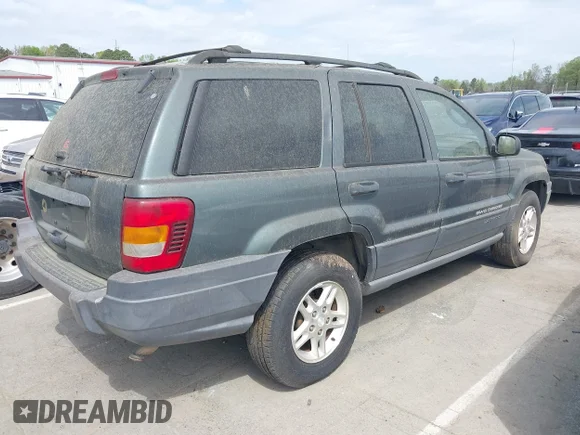 ✅ 2004 Jeep Grand Cherokee Laredo • VIN: 1J4GW48S34C297404 • Lot: 44743936. Wystawiony na IAAI z przebiegiem 103 923 mil. Bezpłatny archiwum sprzedaży aukcyjnych z USA i szczegółowy raport historii pojazdu na DreamBid. Zdjęcie 4.